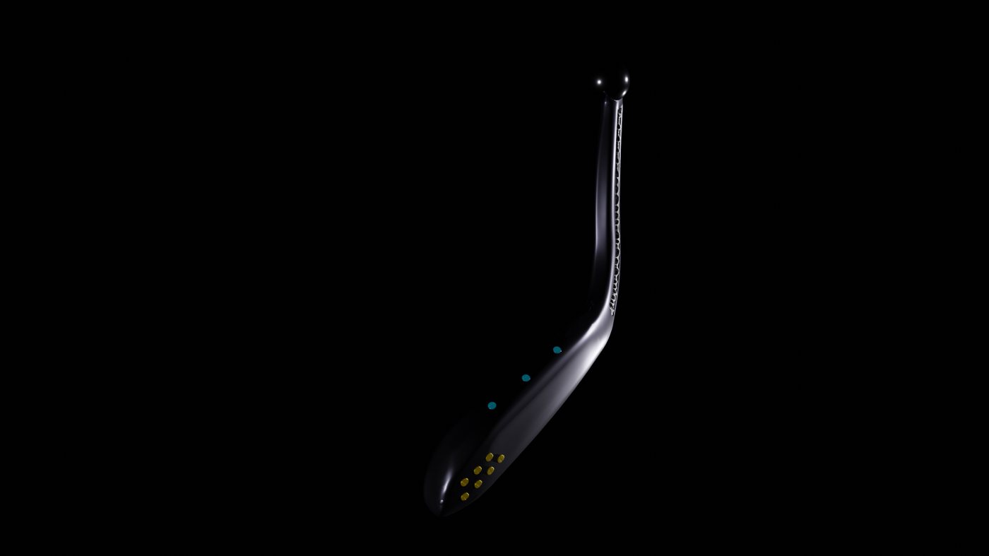 Isolated render of the full ball-and-socket joint implant, from ball head to fixation footplate